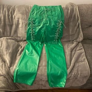 Green leather pants with lace up front and sides